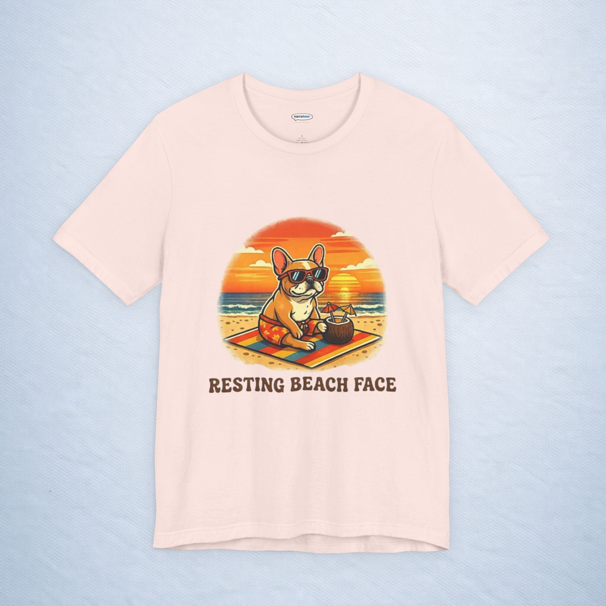 frenchie: resting beach face