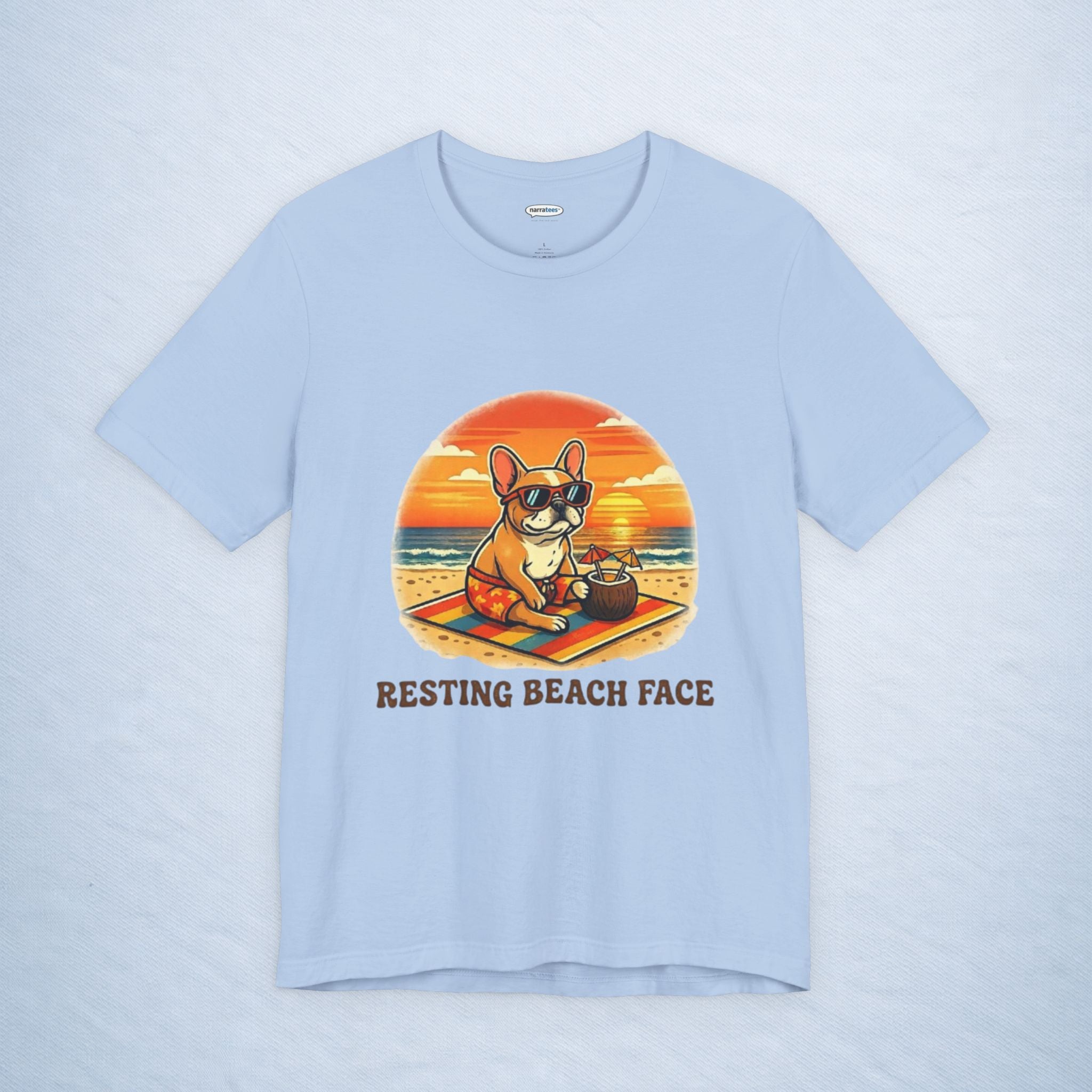 frenchie: resting beach face
